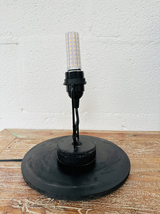 front view of base of cylinder lamp and the bulb used