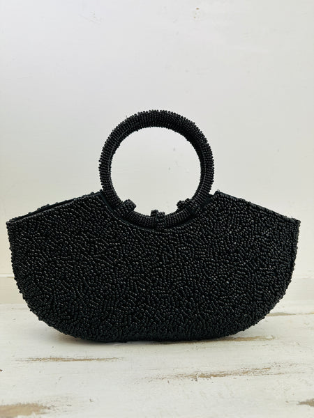 front view of black beaded handbag 