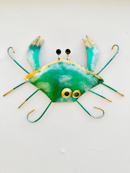 front view of metal crab in green