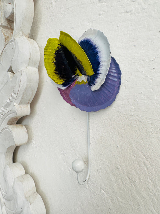 side view display of pansy hook on wall
