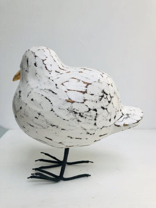 side view of wooden fat seagull