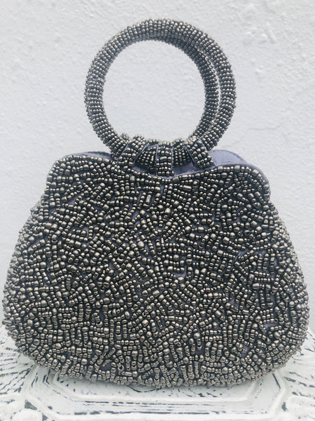 front view of beaded silver handbag