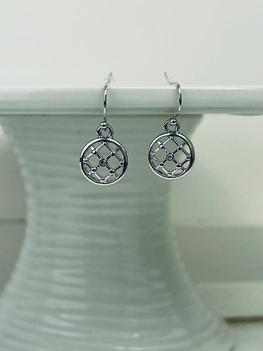 A pair of silver-colored earrings with a simple cross diamond pattern and tiny crystal detail, displayed on a white background.