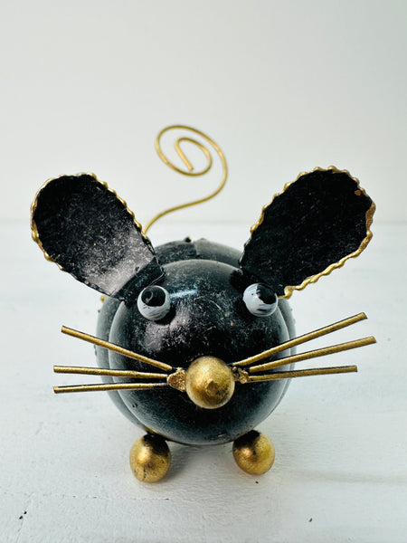 Handmade decorative mouse made from recycled materials with a curly tail, featuring black and gold colors.