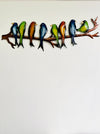 front view of metal stick with birds