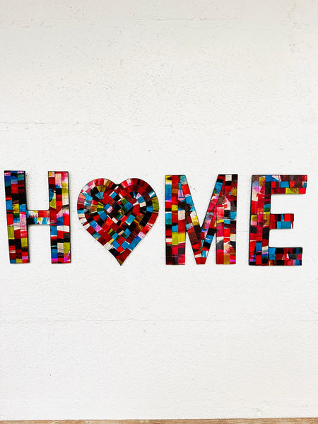 front view of mosaic home letters on a white background