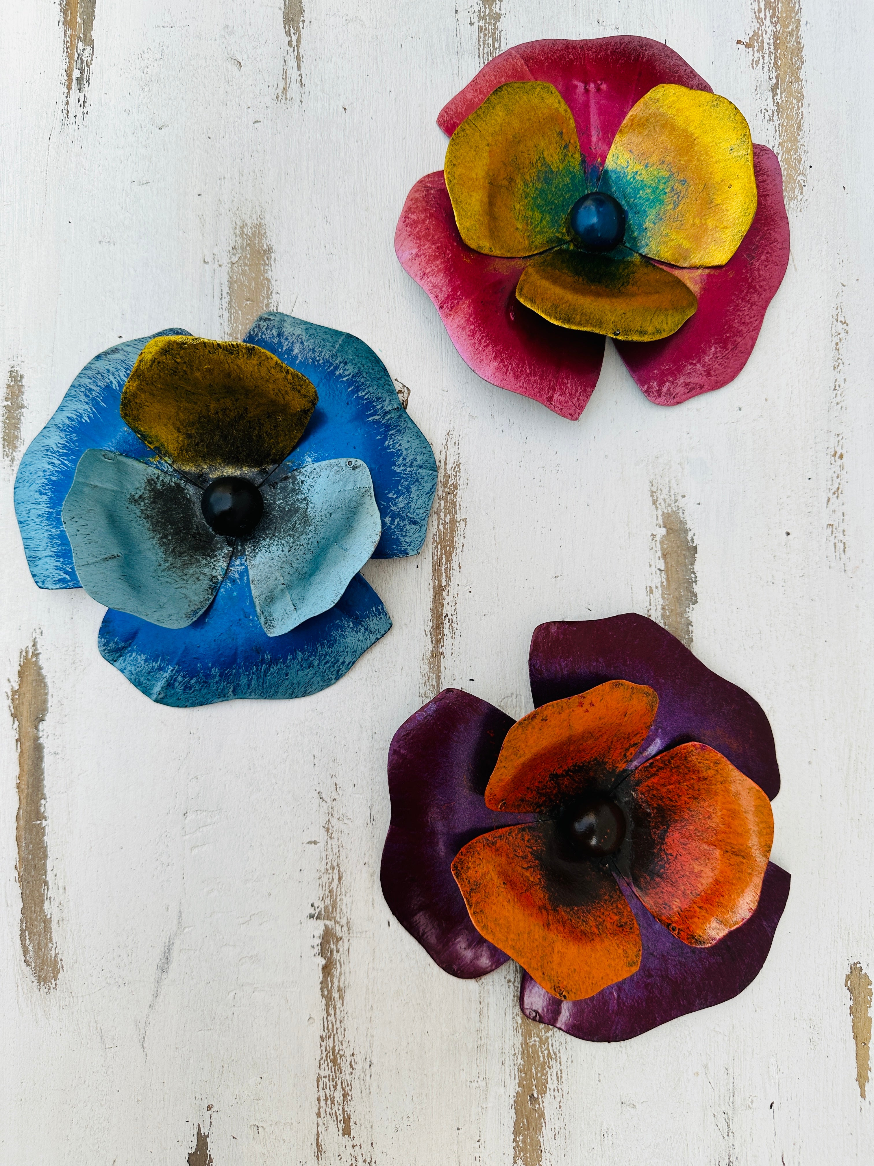 aerial set view of assorted metal pansy flowers