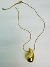 aerial view of gold necklace