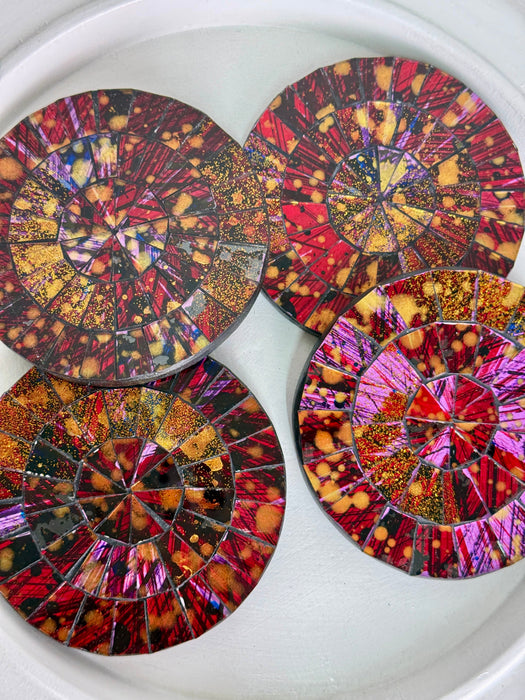 front view of set of four mosaic coasters on white backround