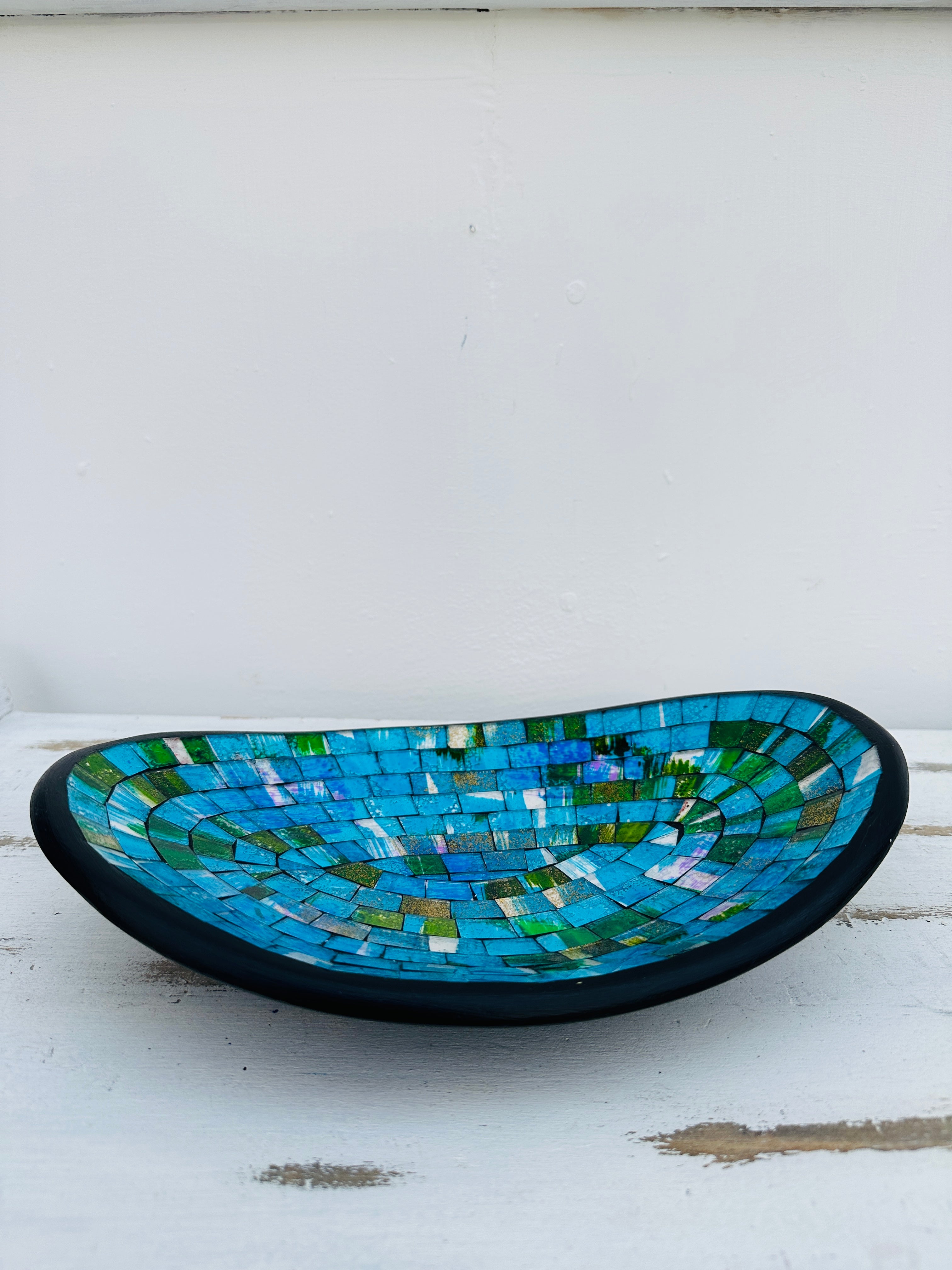 front view of mosaic oval bowl in blue handmade in bali