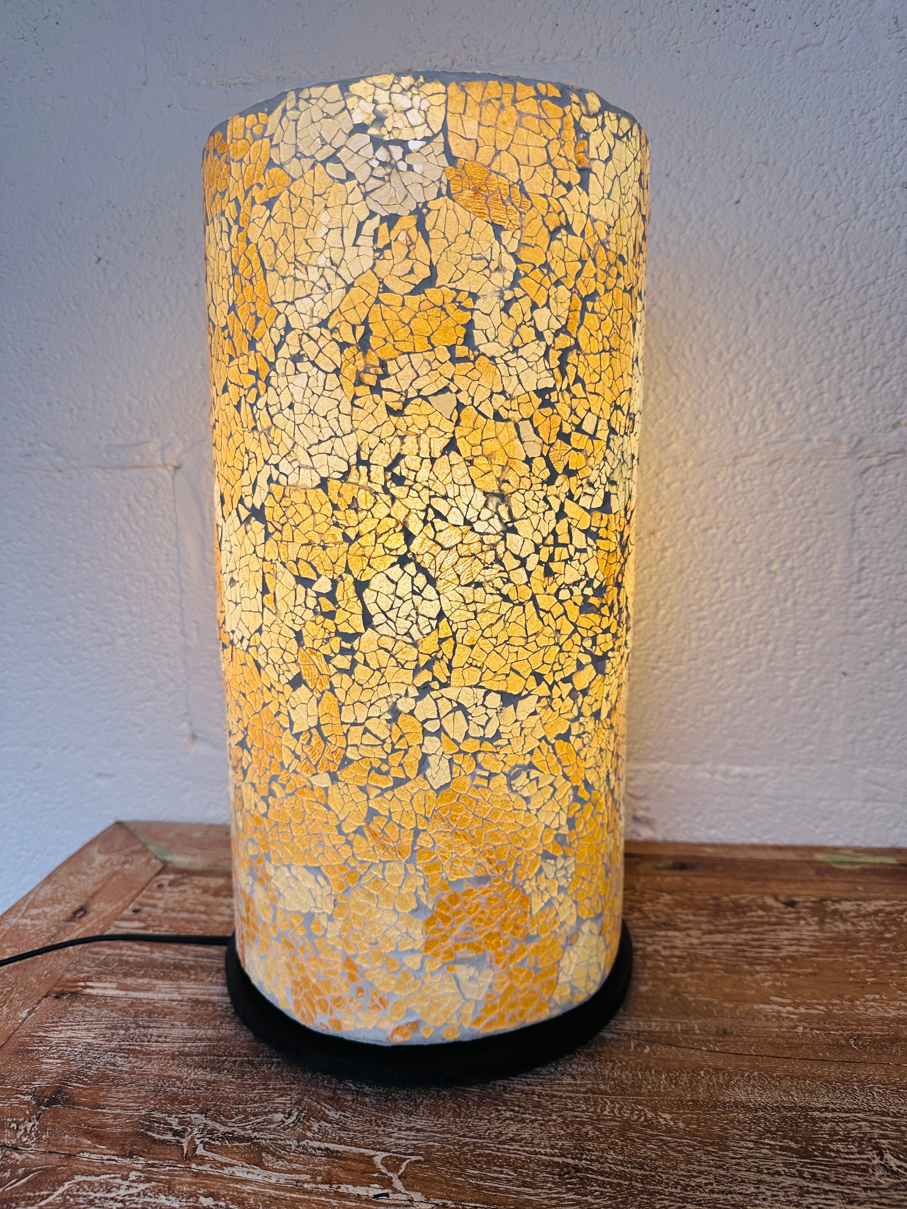 front view of mosaic cylinder lamp light on