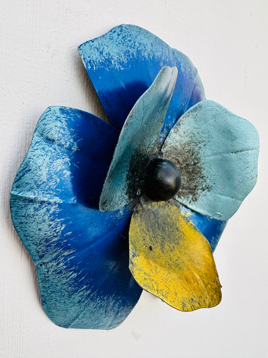 side view of metal pansy flower