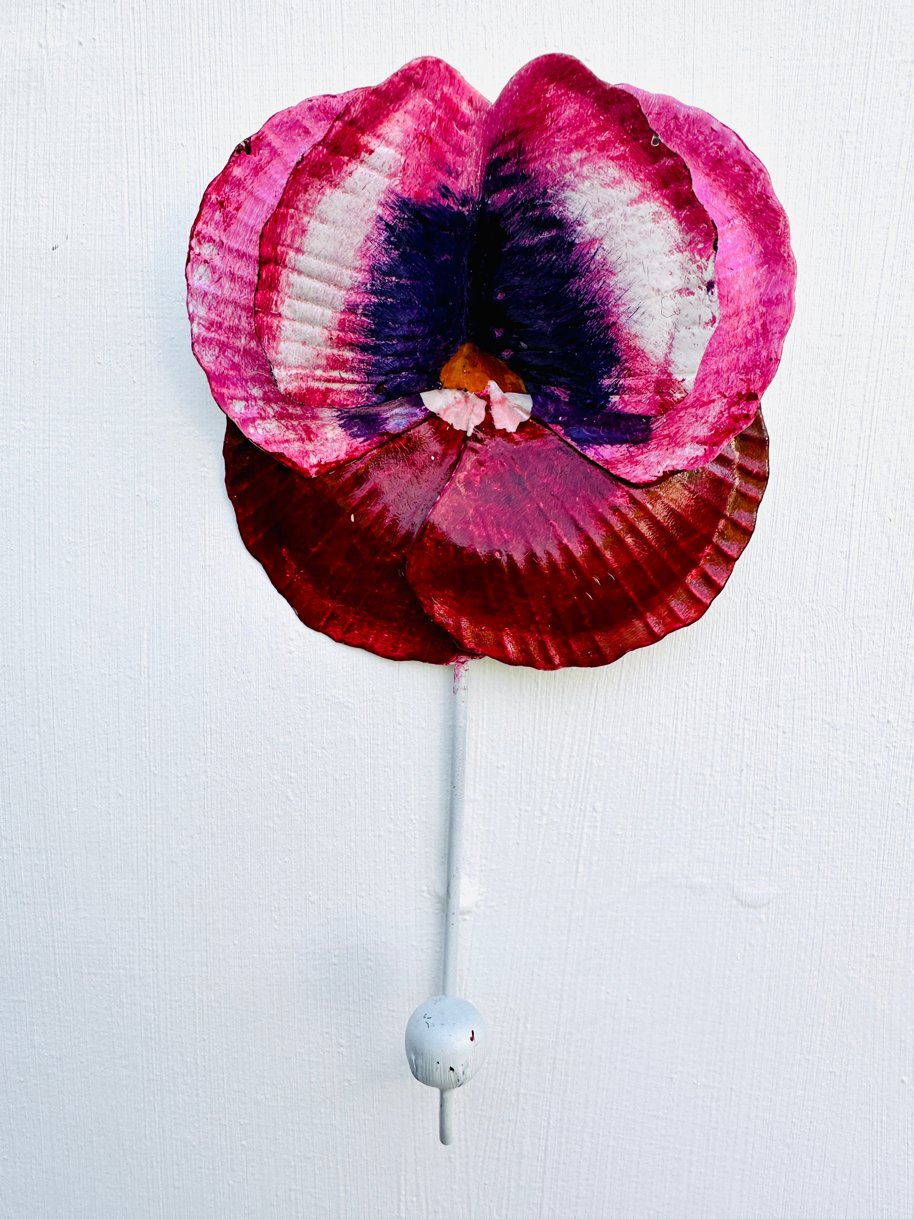 front view of red and pink pansy hook