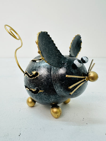 Side View of Metal Mouse Sculpture on White Background