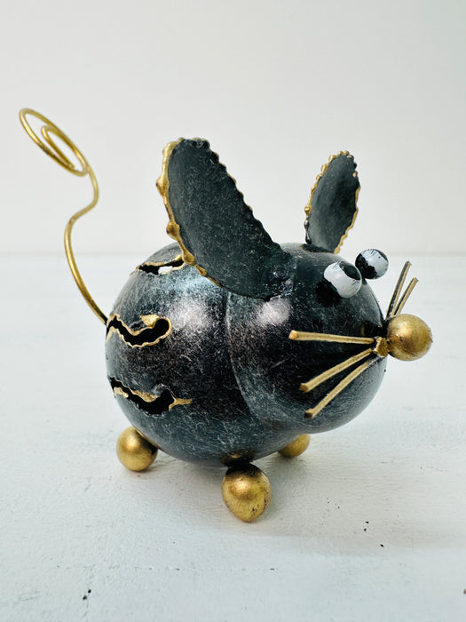 Side View of Metal Mouse Sculpture on White Background