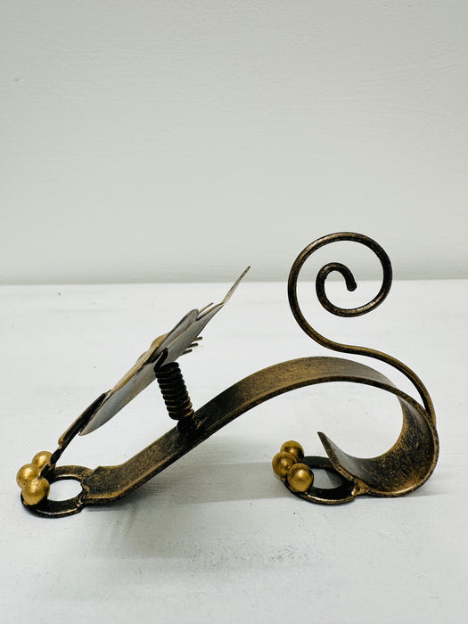 side view of metal baby kitty