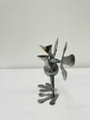side view of metal frog vincent