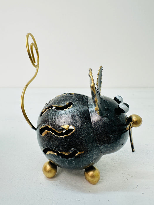 Side View of Metal Mouse Sculpture on White Background