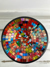 aerial view of round mosaic bowl on white background