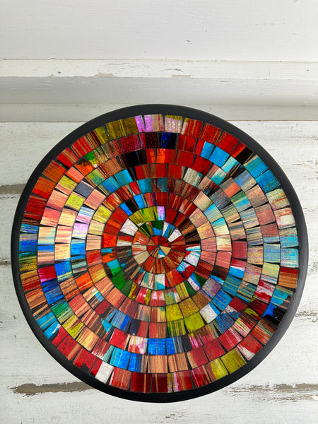 aerial view of round mosaic bowl on white background