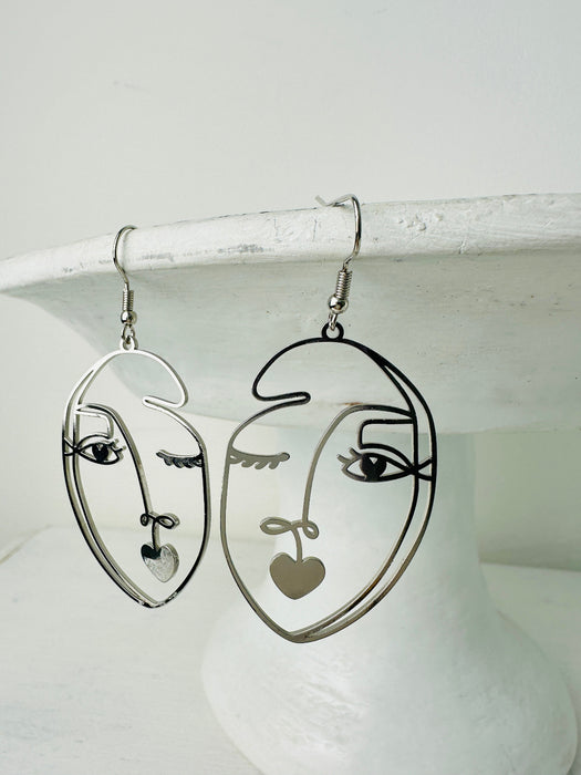 abstract portrait silver dangle earrings