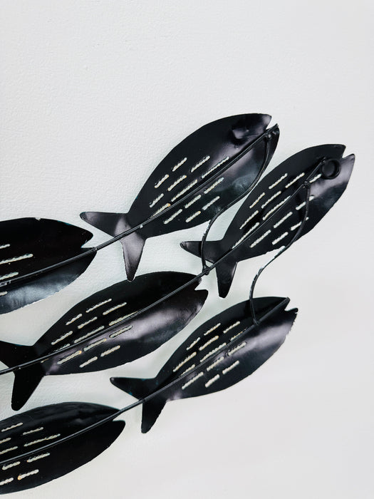 Back view of aqua fish shoal wall sculpture showing hidden mounting eyelets