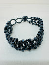 close-up of beaded bracelet