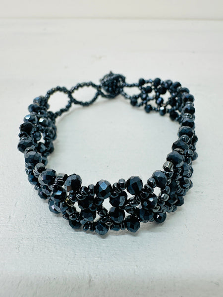 close-up of beaded bracelet