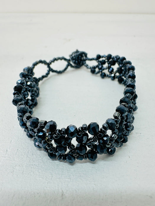 close-up of beaded bracelet