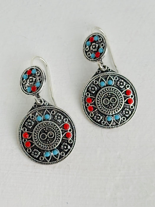 Boho round drop earrings with colourful enamel details in red and turquoise.