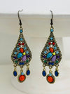 Colorful teardrop earrings with gemstone-like beads on a white background