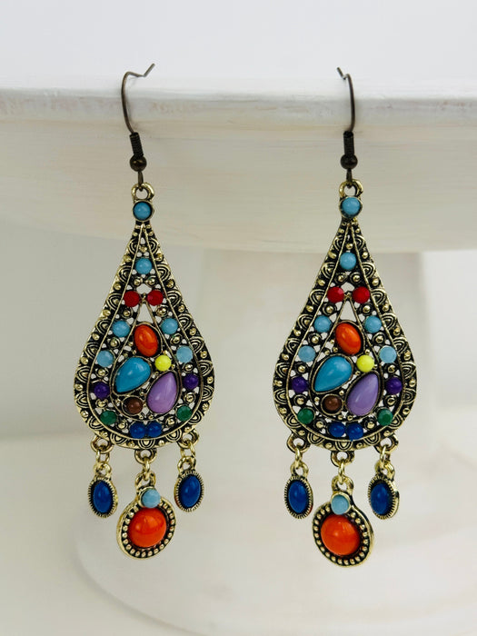 Colorful teardrop earrings with gemstone-like beads on a white background