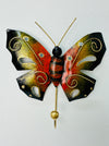 Front view of handmade orange butterfly wall hook.