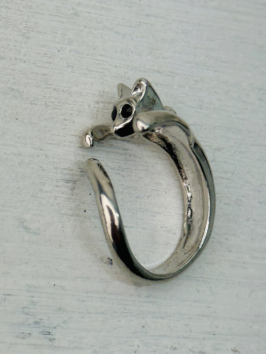 Adorable silver-tone cat hug adjustable ring wrapping around finger, displayed on a white background.