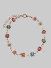 Bracelet with colorful flower-shaped beads on a light gray background