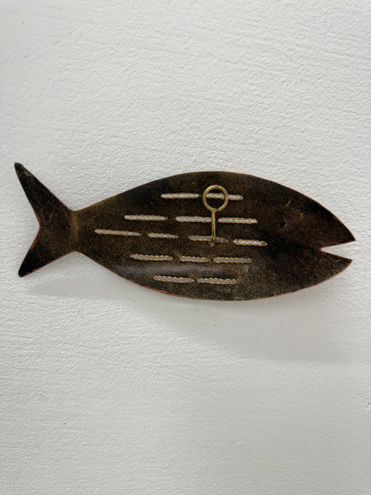 Back of copper and bronze metal fish wall decoration showing hanging point