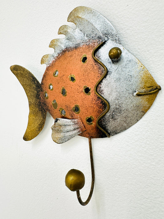 Side view of handmade copper metal fish hook.