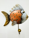Handmade copper and silver fish hook with gold detailing.