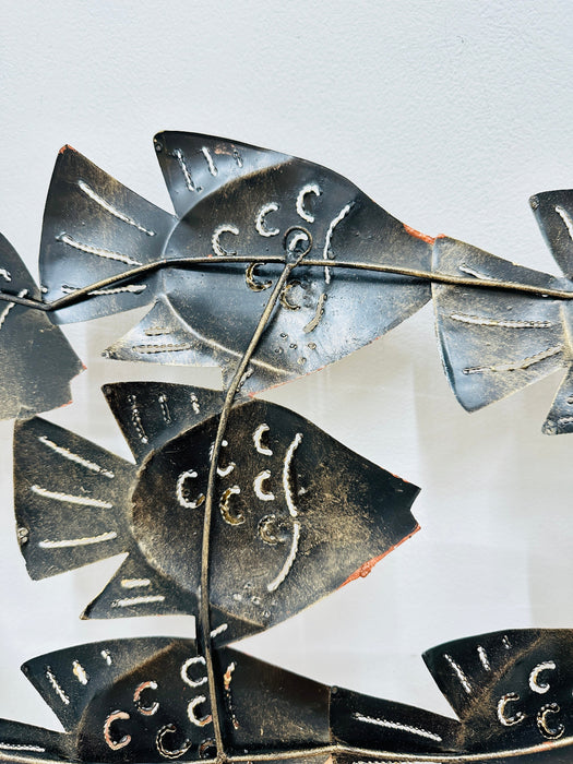 Back view of small copper reef fish shoal wall sculpture showing hanging structure