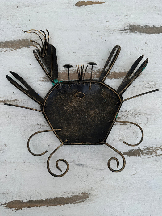 Back of blue crab metal wall decoration showing hanging eyelet and metal construction
