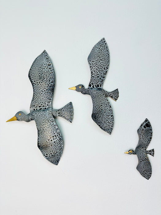 Hand-painted crackle metal seabird set of 3 displayed on wall