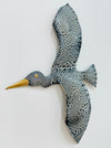 Medium seabird from crackle metal wall art set shown close-up