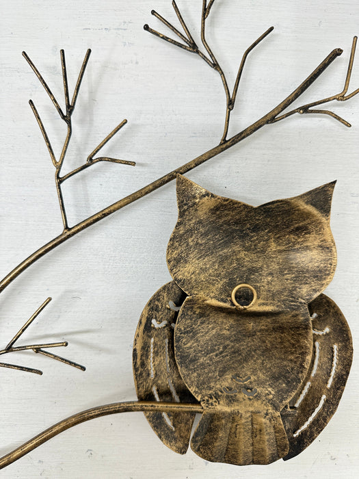 Back side of metal owl trio showing hanging eyelet