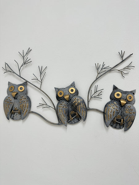 Front view of three crackle-effect metal owls on a branch, hand painted with gold detailing.