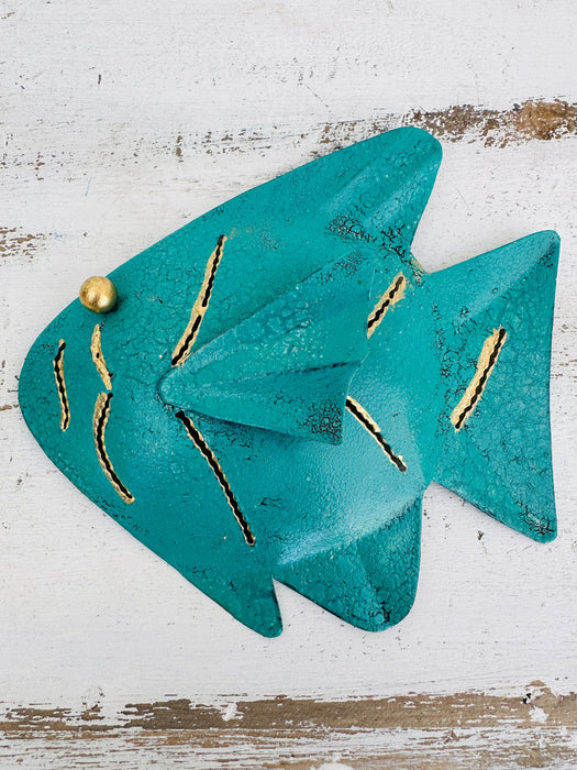 Front view of turquoise metal fish wall art showing crackle texture and gold accents
