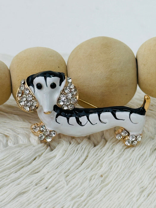 Dog-shaped brooch with crystla details