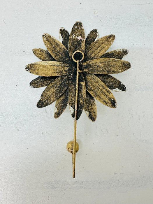 Back view of handmade daisy wall hook.