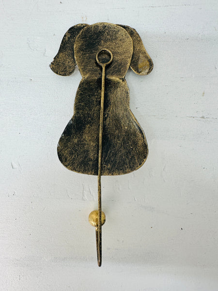 Back view of gold and silver dog hook.