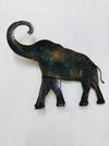 Back view of large metal elephant wall art showing hanging details