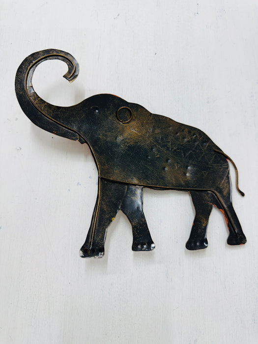 Back view of large metal elephant wall art showing hanging details
